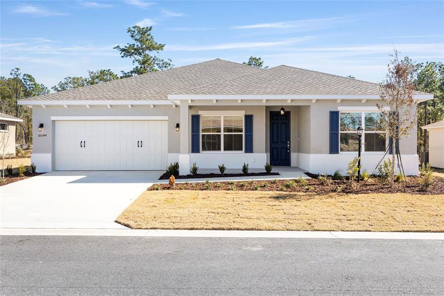 Front exterior of a new home in , Ocala, FL, highlighting curb appeal (Image 19).