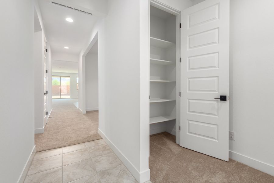 Spacious, unfurnished interior of a new home in Estrella, Goodyear (Image 9). Spacious, unfurnished interior of a new home in Estrella, Goodyear (Image 9).