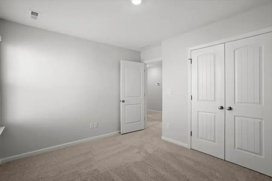 Spacious, unfurnished interior of a new home in Sweetbrier, Durham (Image 28). Spacious, unfurnished interior of a new home in Sweetbrier, Durham (Image 28).