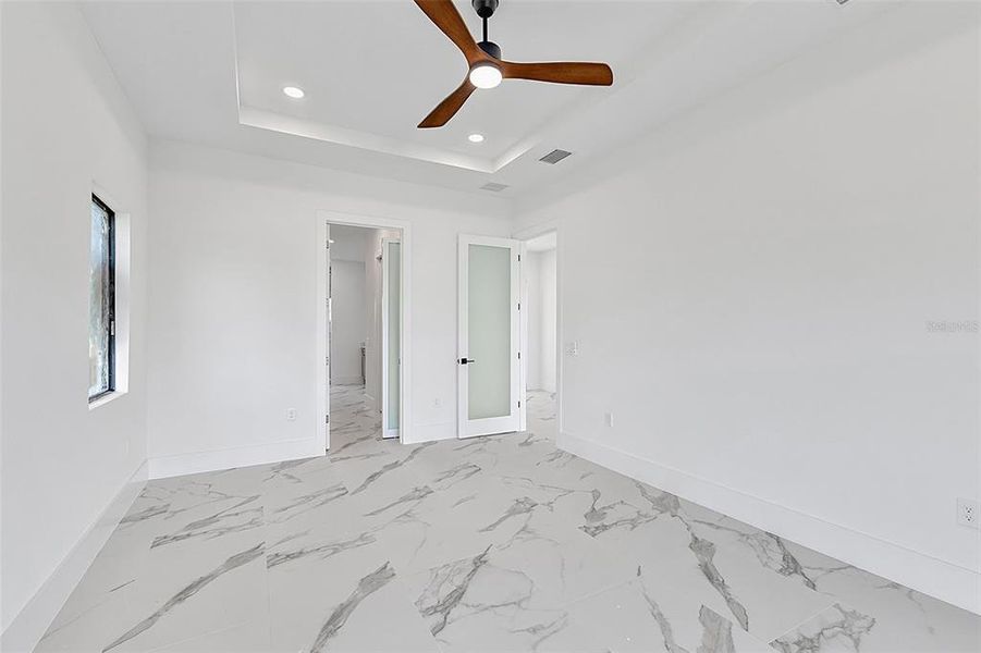 Spacious, unfurnished interior of a new home in , Port Charlotte (Image 50).
