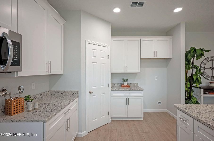 Furnished interior view inside a new home in , Jacksonville (Image 29).