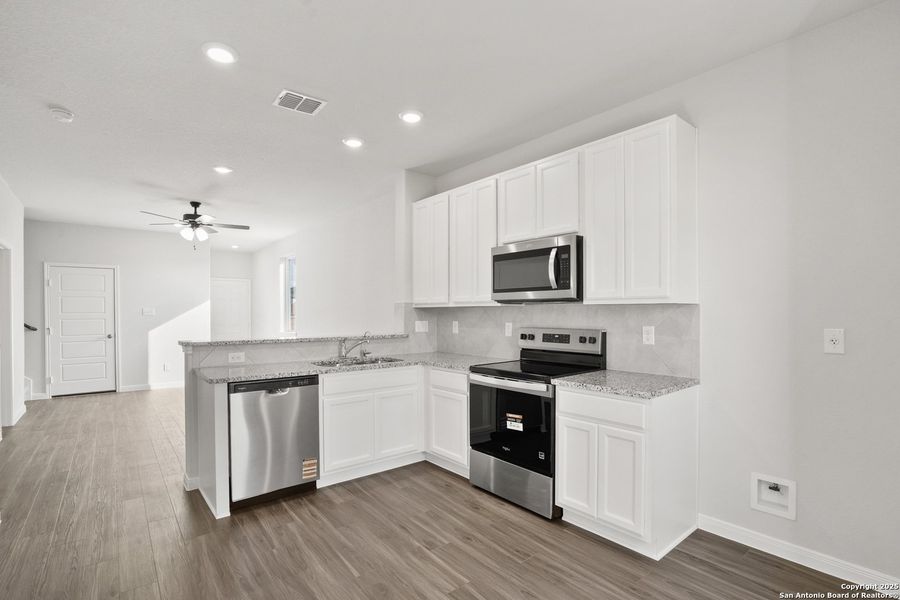 Furnished interior view inside a new home in Katzer Ranch, Converse (Image 9).