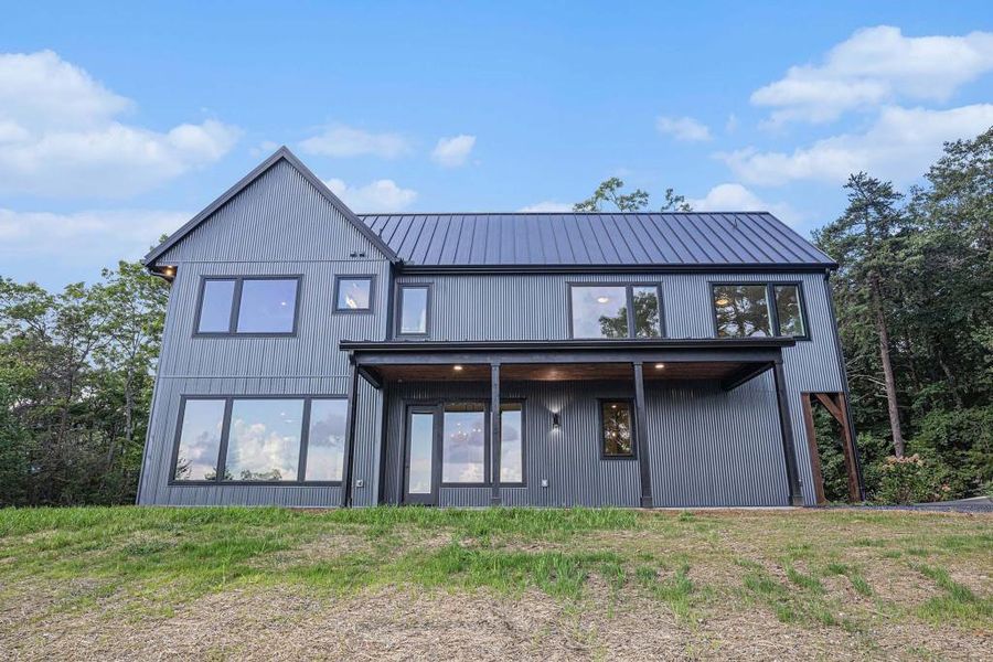 Front exterior of a new home in , Clayton, GA, highlighting curb appeal (Image 23).