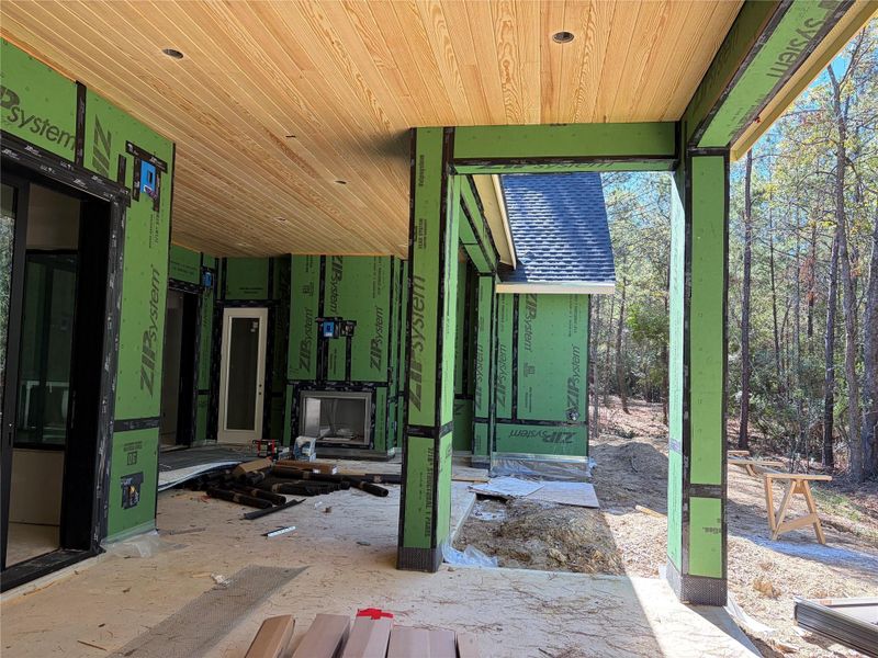 View of fireplace at covered patio