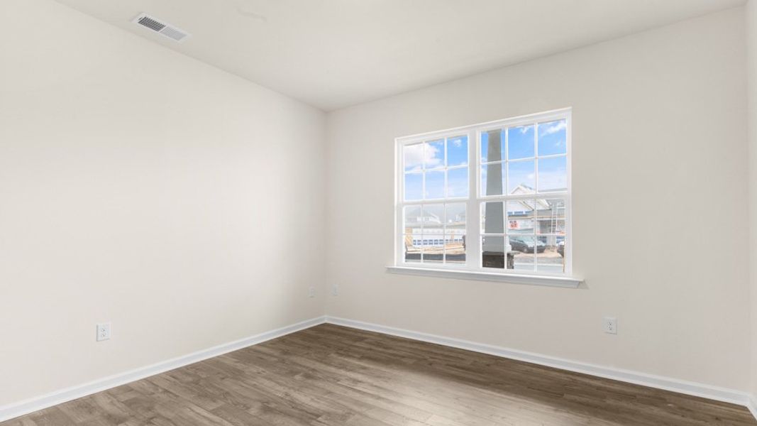 Spacious, unfurnished interior of a new home in The Estates at Edinborough, Gibsonville (Image 15).