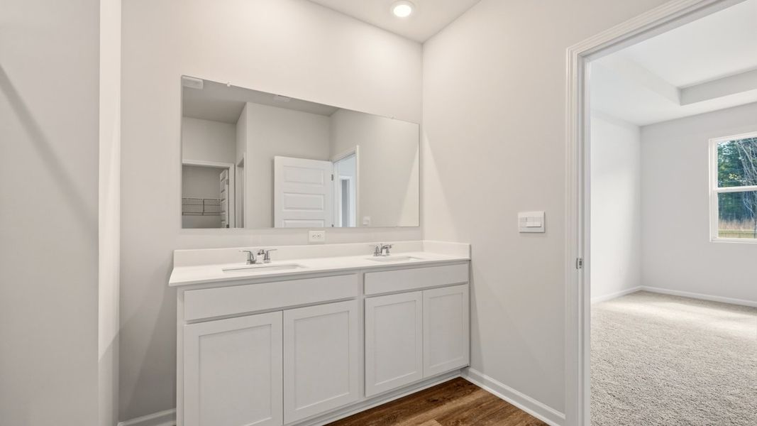 Furnished interior view inside a new home in The Reserve at Calcutta, Stockbridge (Image 11).