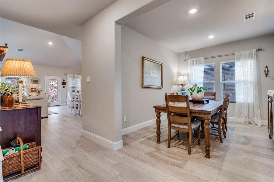 Dining space featuring recessed lighting and light wood-style flooring Dining space featuring recessed lighting and light wood-style flooring