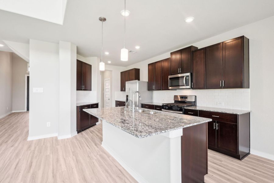 Photo is not of the actual home, but is an inspirational photo of builder’s model home and may depict options, furnishings, and/or decorator features that are not included