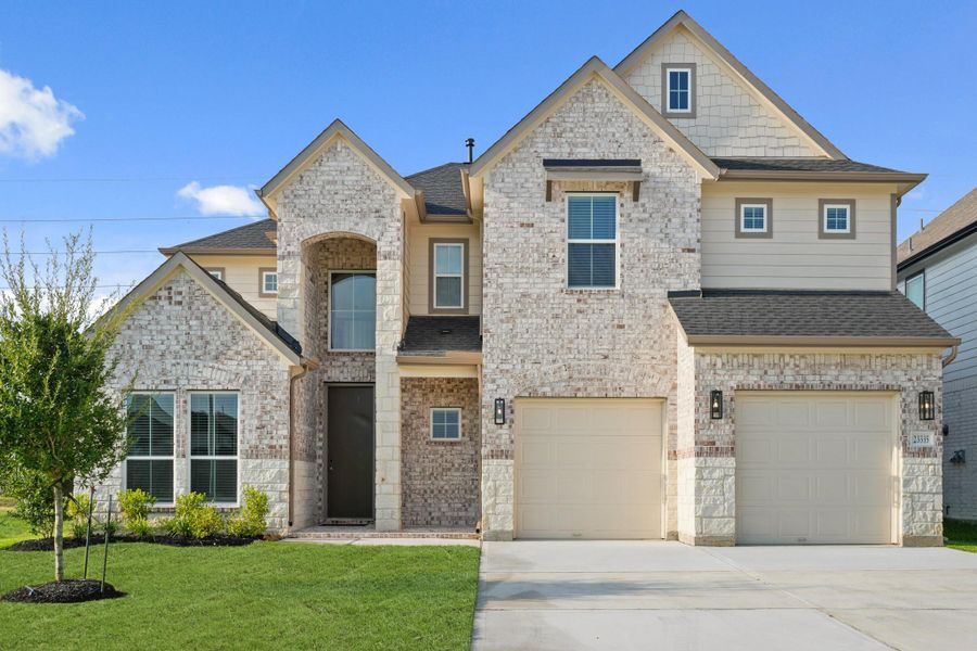 Front exterior of a new home in Morton Creek Ranch, Katy, TX, highlighting curb appeal (Image 15).