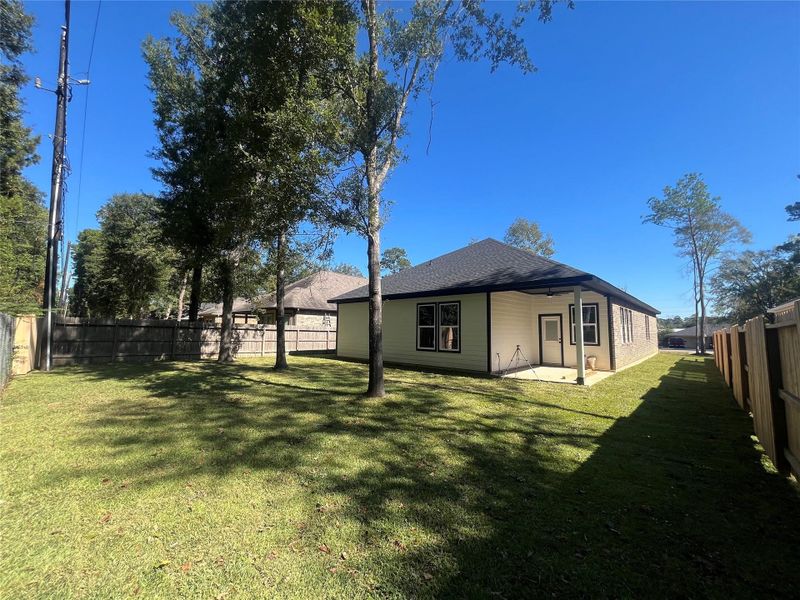 28811 Champion Oaks S view of the yard and covered patio 28811 Champion Oaks S view of the yard and covered patio