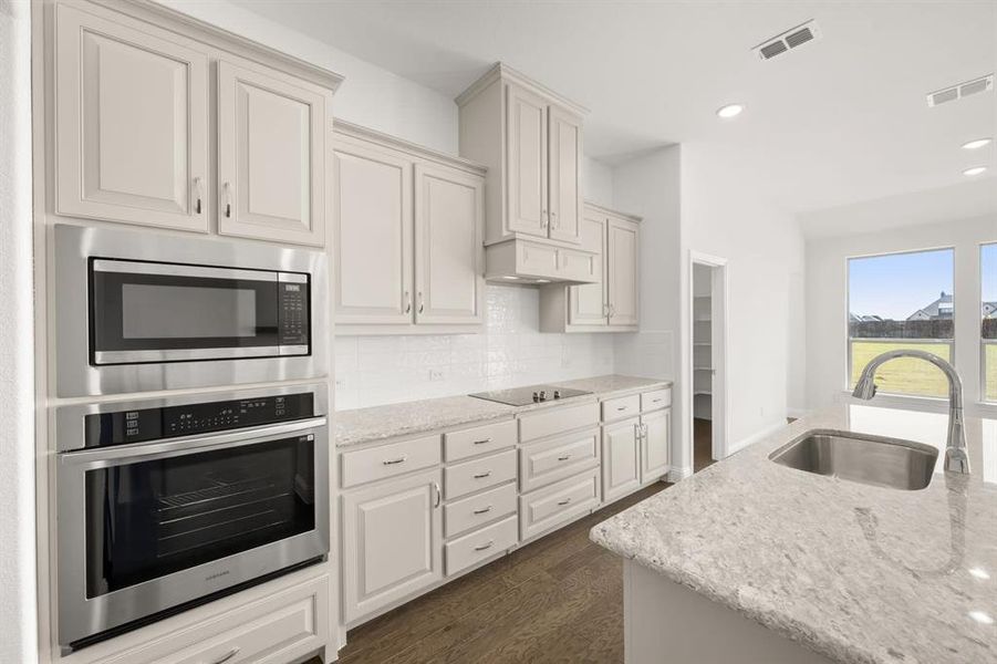 Furnished interior view inside a new home in Coyote Crossing, Godley (Image 15).