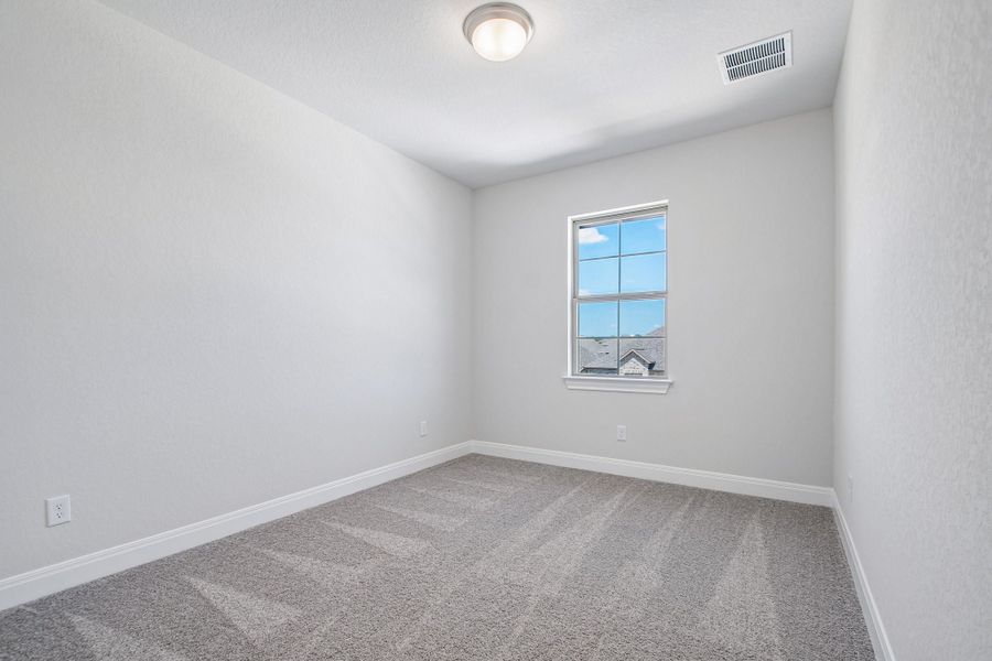 Spacious, unfurnished interior of a new home in 6 Creeks, Kyle (Image 34).