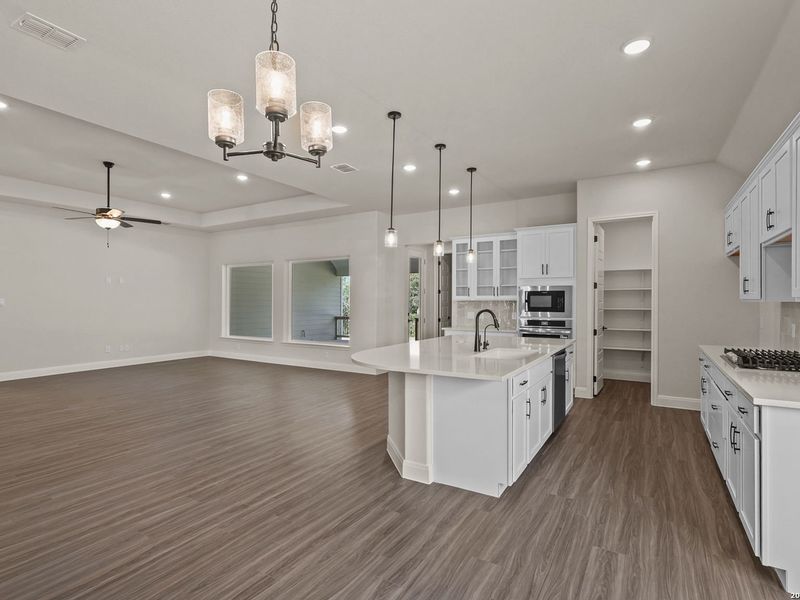Furnished interior view inside a new home in Potranco Oaks, Castroville (Image 10).