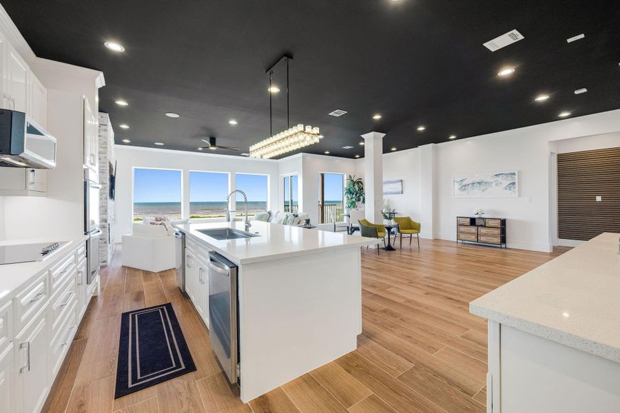 Kitchen open to the living room with views of the gulf.