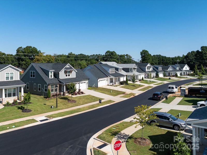 Front exterior of a new home in Phillips Village, Matthews, NC, highlighting curb appeal (Image 2).