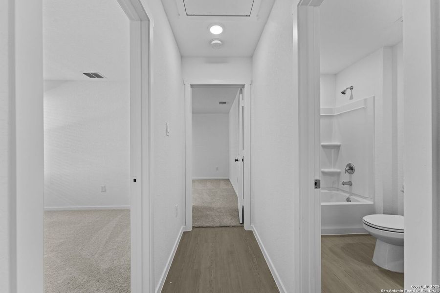 Spacious, unfurnished interior of a new home in Torian Village: Belmar Collection, San Antonio (Image 9).