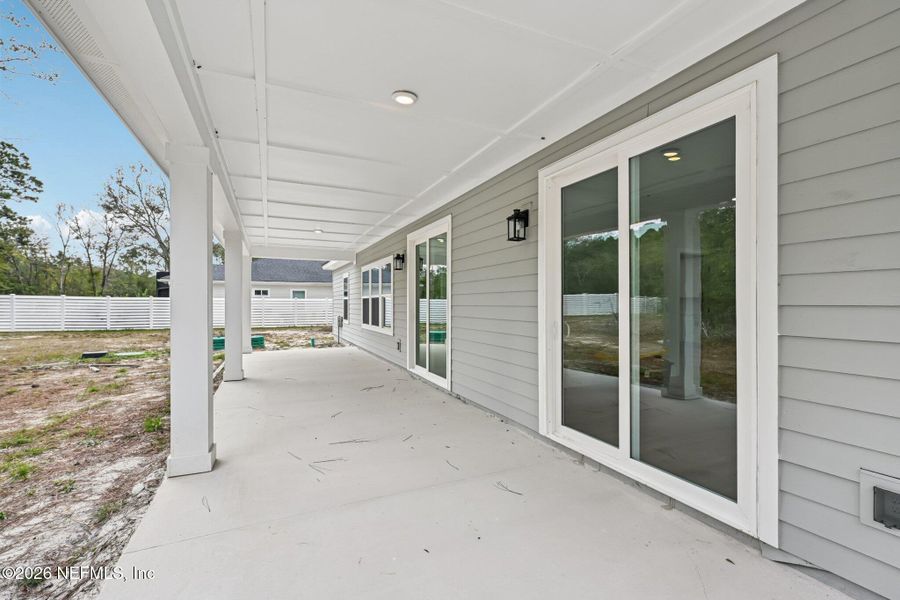 Exterior details and patio area of a home in , Fernandina Beach (Image 29).