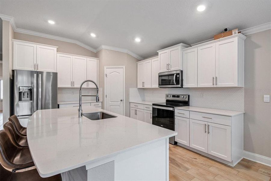 Furnished interior view inside a new home in Sawmill Branch, Palm Coast (Image 5). Furnished interior view inside a new home in Sawmill Branch, Palm Coast (Image 5).