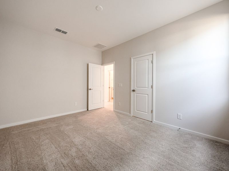 A room with white doors.