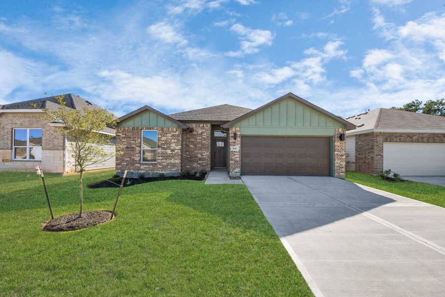 Front exterior of a new home in Grand Oaks Reserve, Cleveland, TX, highlighting curb appeal (Image 22).