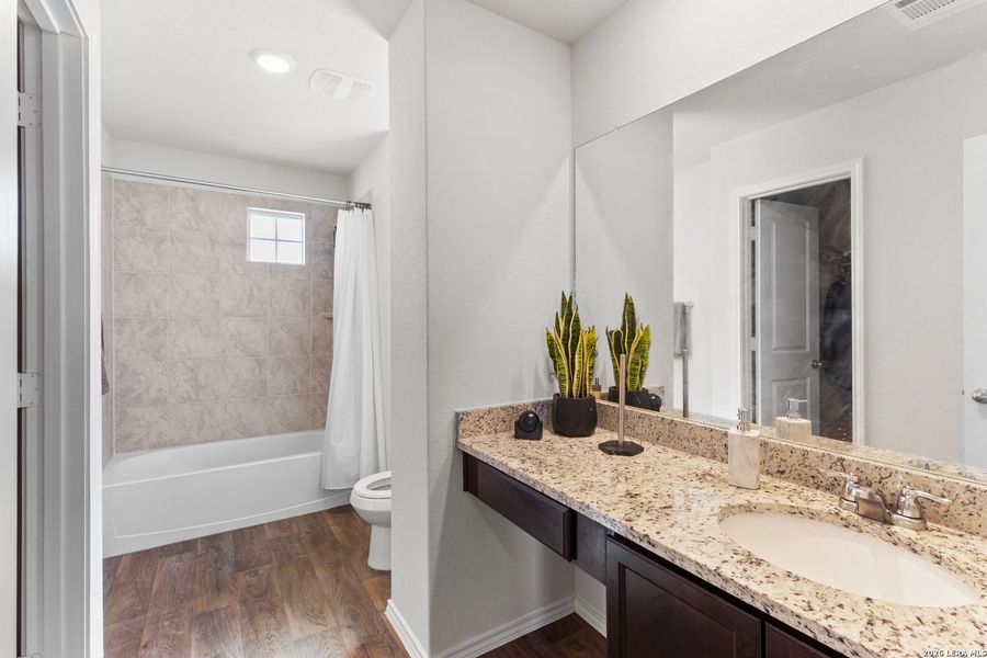 Furnished interior view inside a new home in Redbird Ranch, San Antonio (Image 14).