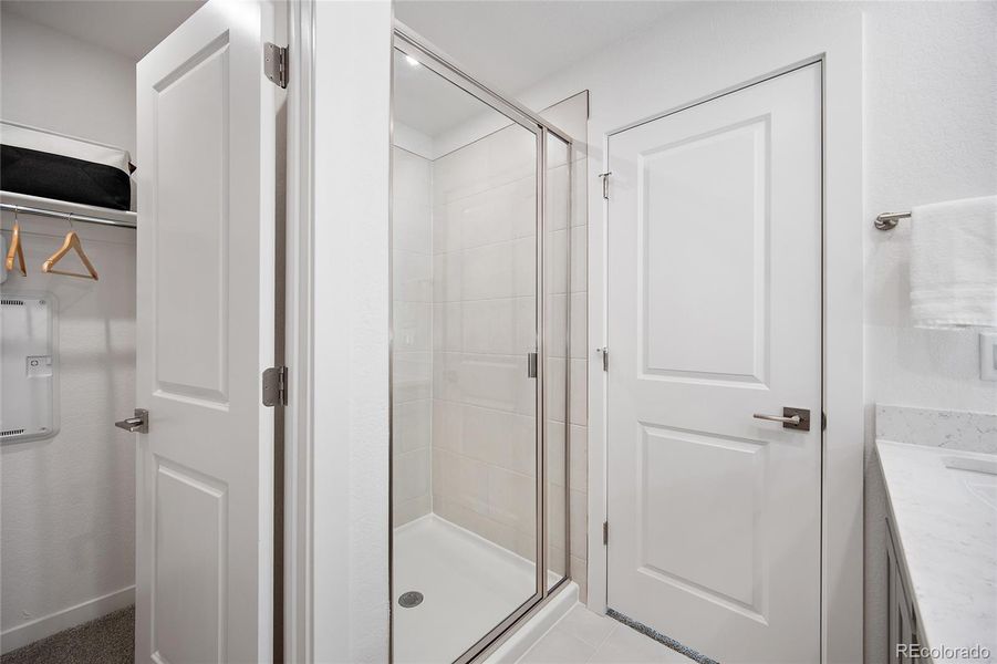 Furnished interior view inside a new home in The Commons at Victory Ridge, Colorado Springs (Image 24).
