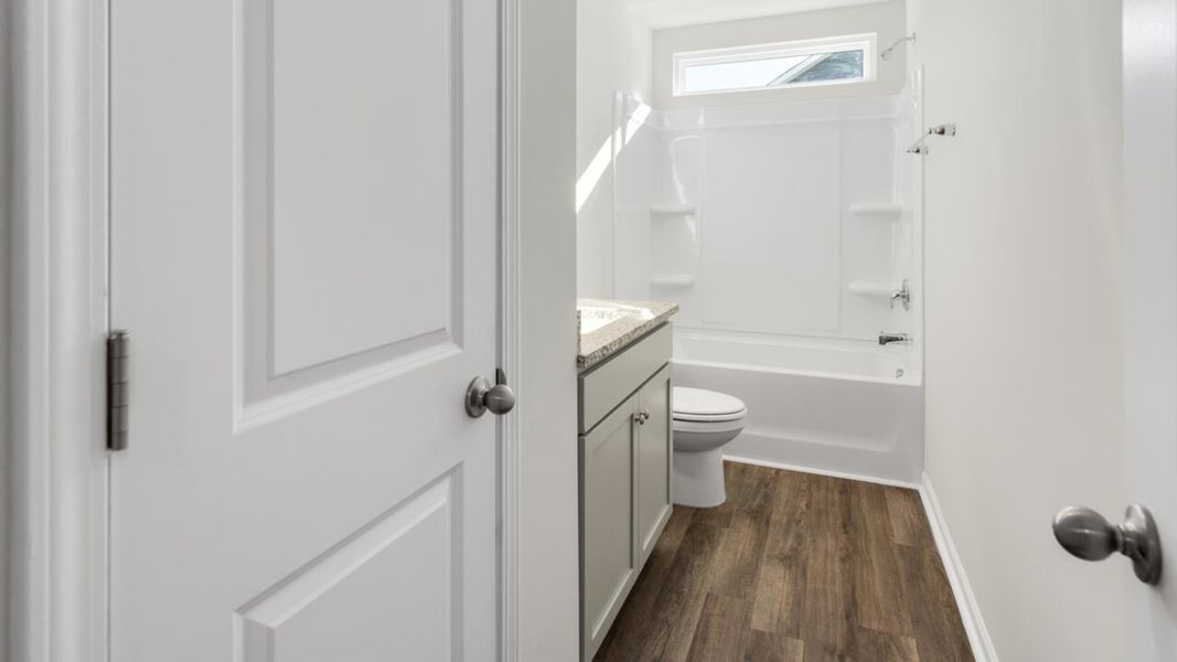 Representative unfurnished interior of a home built from the TILLMAN by D.R. Horton in Surfside Landing, Hubert (Image 43).