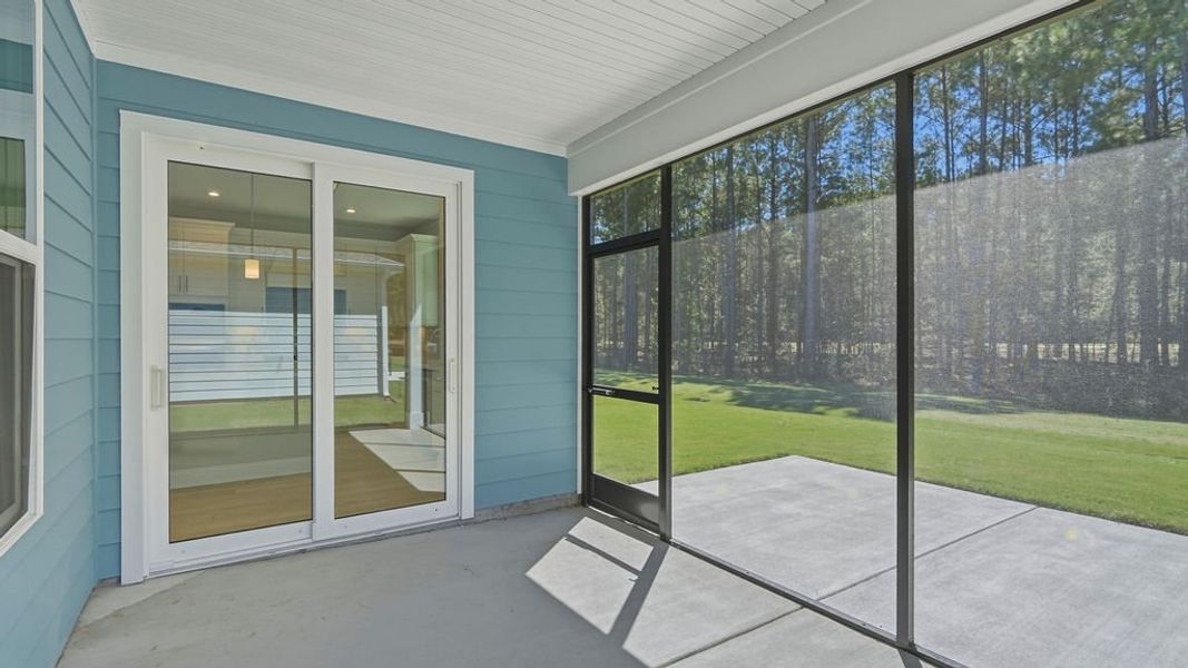 Exterior details and patio area of a home in Sun City Hilton Head, Bluffton (Image 23).