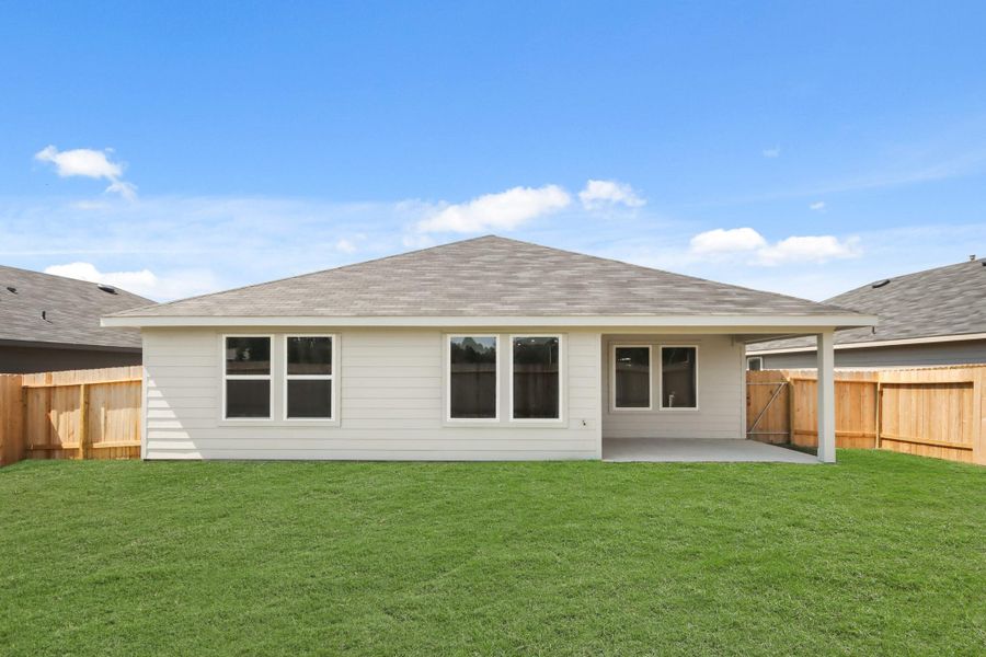 Exterior details and patio area of a home in Grand Pines, Magnolia (Image 3).