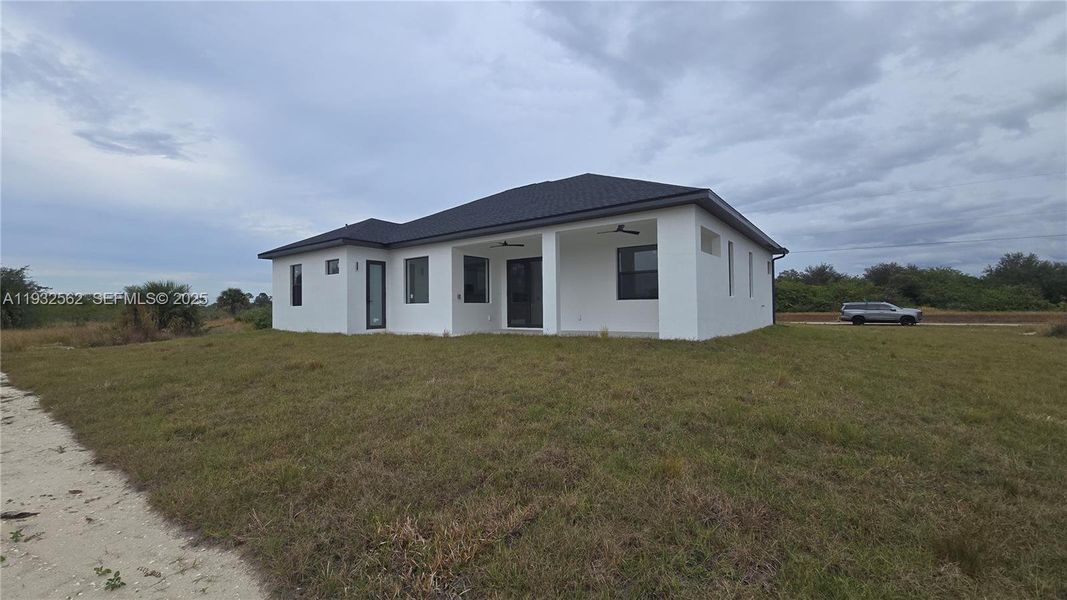 Exterior details and patio area of a home in , Lehigh Acres (Image 28).