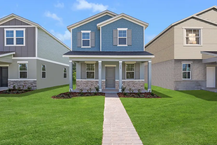 Front exterior of a new home in Brack Ranch, St. Cloud, FL, highlighting curb appeal (Image 2). Front exterior of a new home in Brack Ranch, St. Cloud, FL, highlighting curb appeal (Image 2).