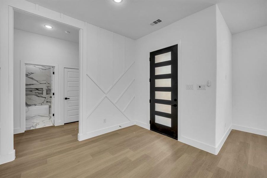 Foyer featuring light hardwood / wood-style floors