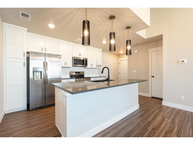 Furnished interior view inside a new home in The Lakes at Centerra, Loveland (Image 6).