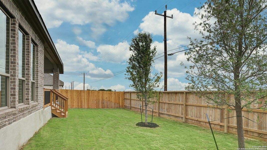 Exterior details and patio area of a home in Alsatian Oaks 50', Castroville (Image 22).