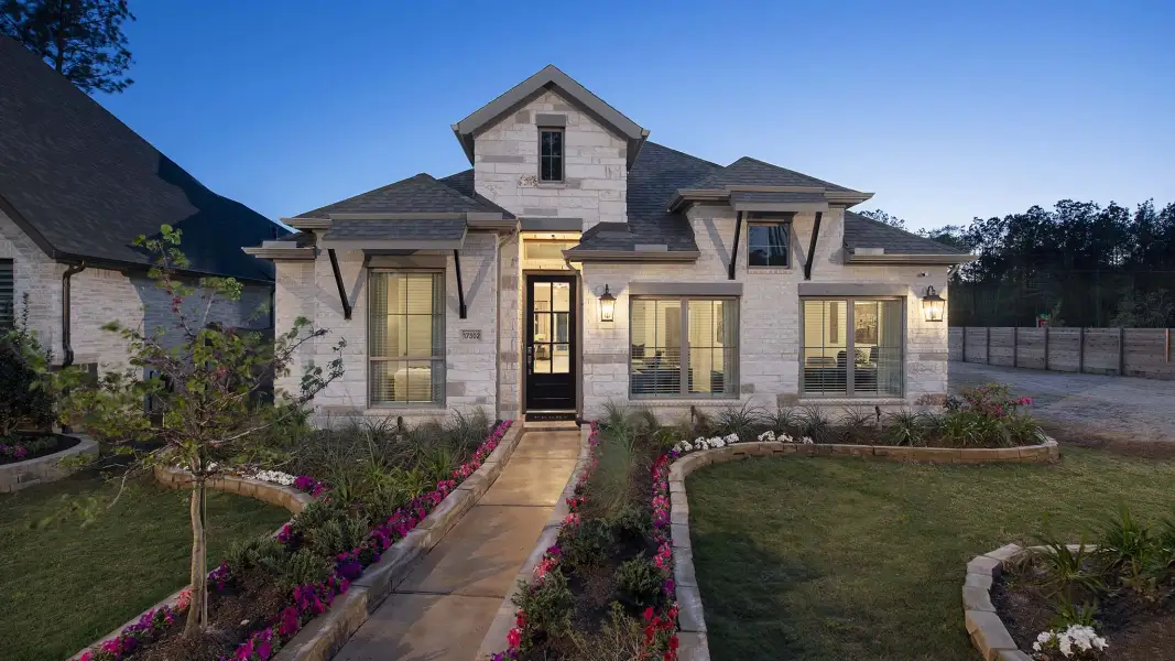Front exterior of a new home in Escondido, Magnolia, TX, highlighting curb appeal (Image 21).