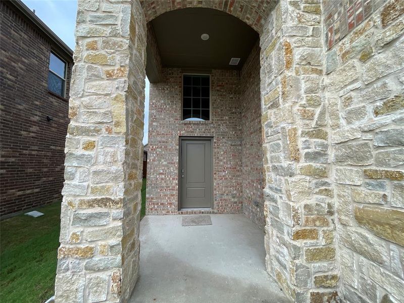 Exterior details and patio area of a home in Elevon, Lavon (Image 4).