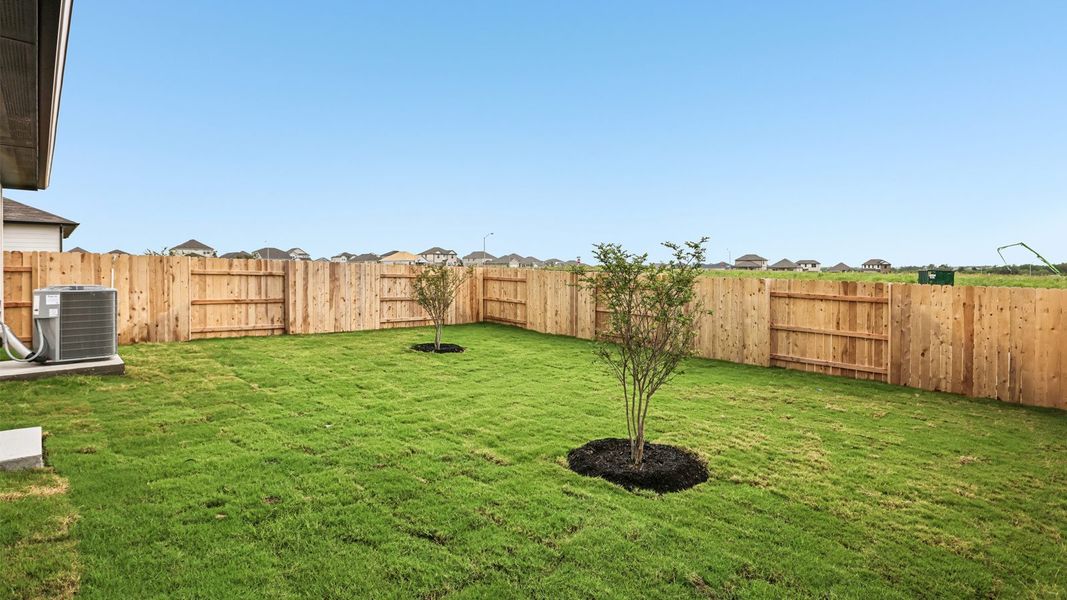 Exterior details and patio area of a home in Briarwood, Elgin (Image 25).