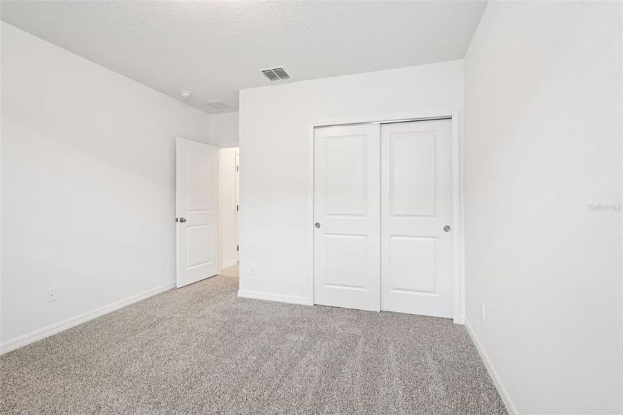 Spacious, unfurnished interior of a new home in Crosswinds - Signature Series, Haines City (Image 21).