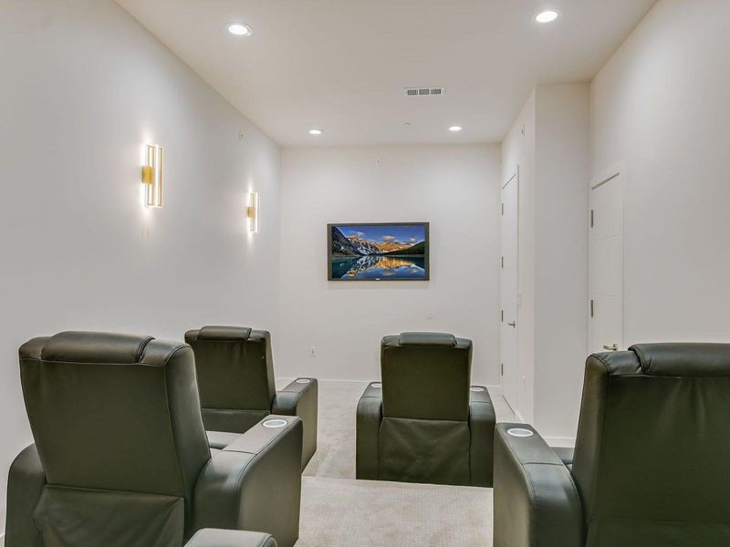 Indulge in cinematic experiences within this dedicated media room. Indulge in cinematic experiences within this dedicated media room.