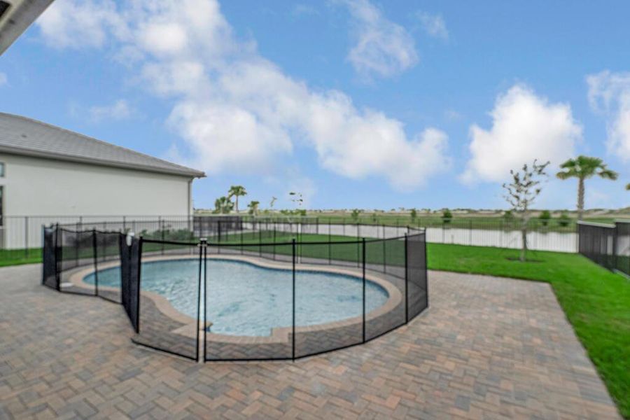 Exterior details and patio area of a home in Apex at Avenir, Palm Beach Gardens (Image 40).