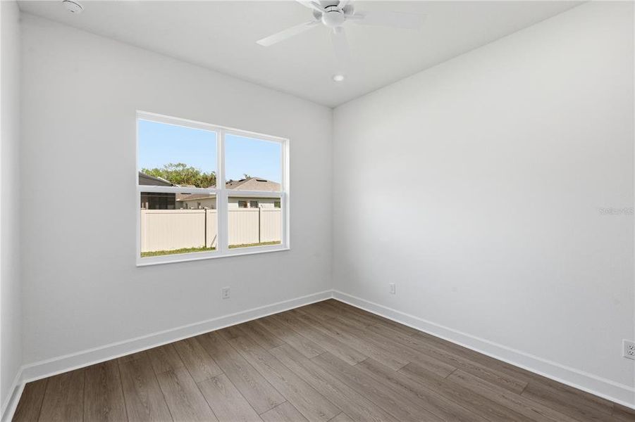 Spacious, unfurnished interior of a new home in Parkdale Place, Oviedo (Image 11).