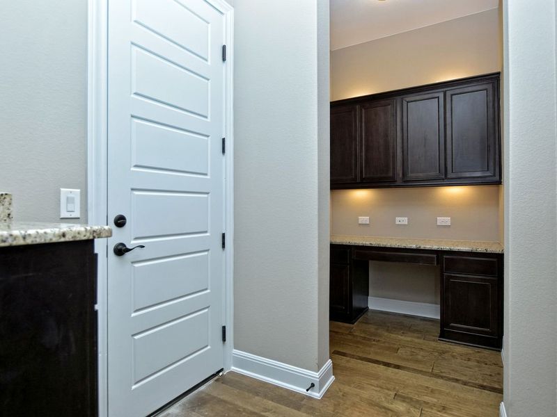 Representative furnished interior of a home built from the Madera II by Giddens Homes in Scofield Farms Estates, Georgetown (Image 257).