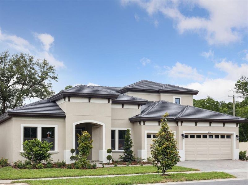 Front exterior of a new home in Crestwood Estates, Valrico, FL, highlighting curb appeal (Image 2). Front exterior of a new home in Crestwood Estates, Valrico, FL, highlighting curb appeal (Image 2).