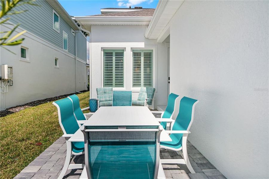 Exterior details and patio area of a home in Emerald Landing at Waterside at Lakewood Ranch – Cottage Series, Sarasota (Image 26). Exterior details and patio area of a home in Emerald Landing at Waterside at Lakewood Ranch – Cottage Series, Sarasota (Image 26).