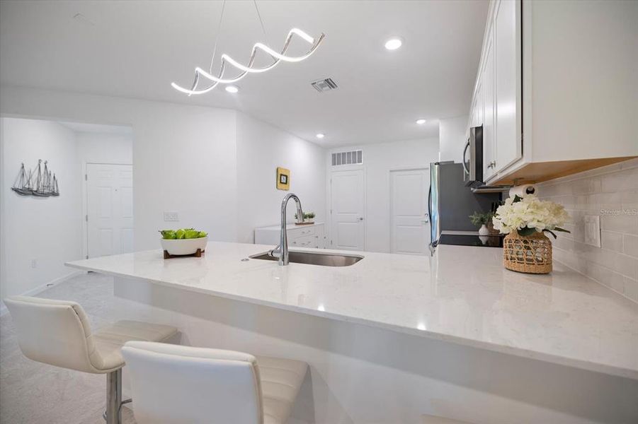 Furnished interior view inside a new home in , Sarasota (Image 31).