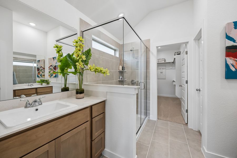Primary Bath in the Pecos home plan by Trophy Signature Homes – REPRESENTATIVE PHOTO