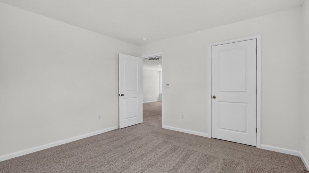 Spacious, unfurnished interior of a new home in The Reserve at Prestleigh, Wake Forest (Image 27).