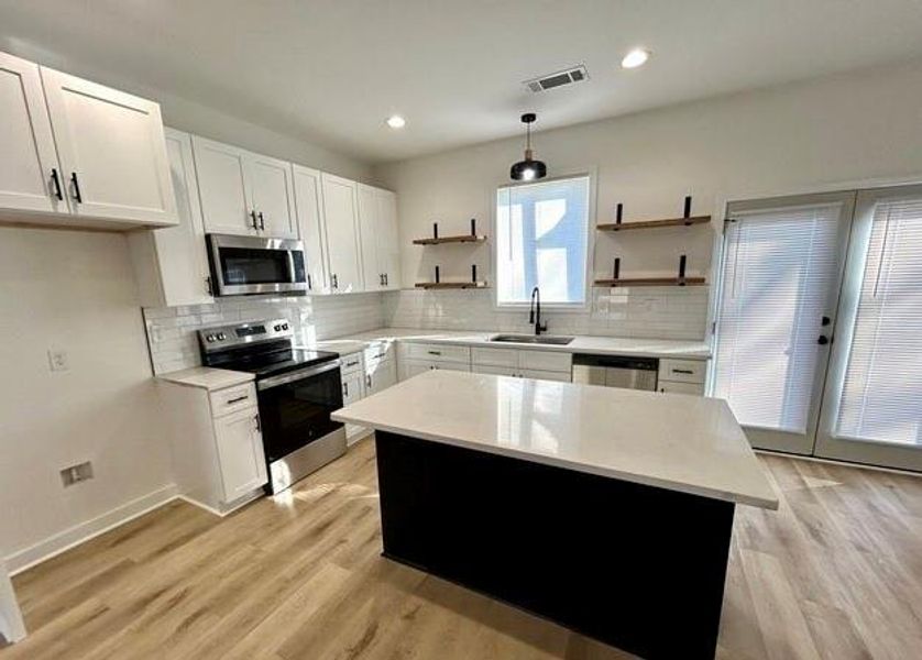 Furnished interior view inside a new home in , Buchanan (Image 11).
