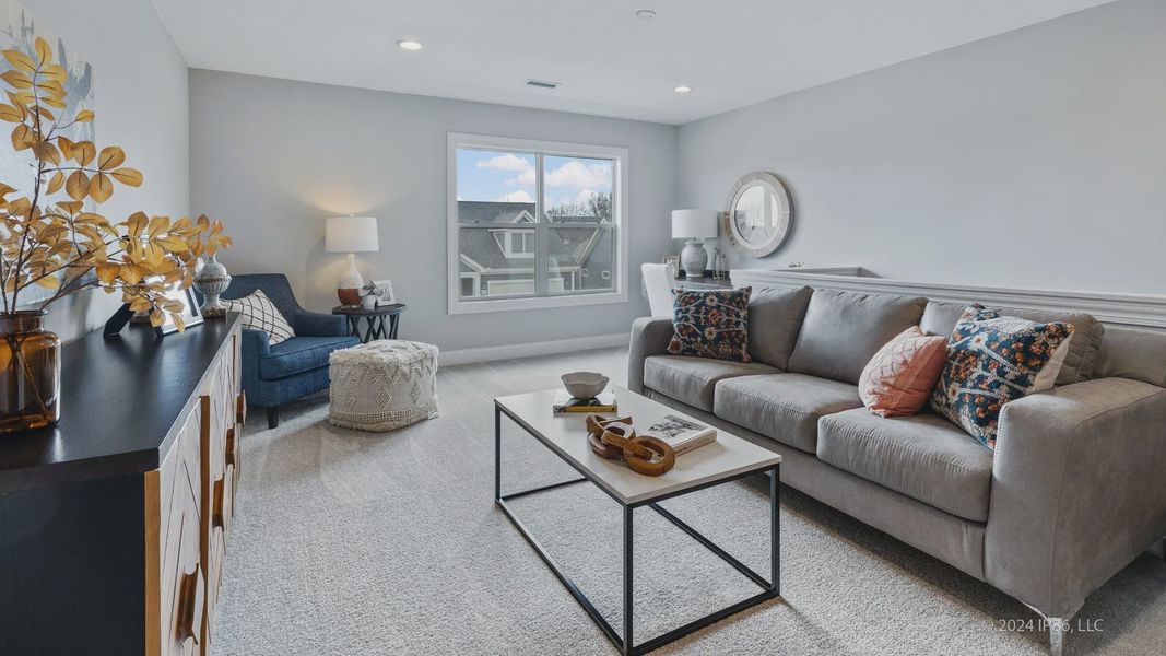 Representative furnished interior of a home built from the Cambridge by Epcon Communities in The Courtyards at Oak Grove, Durham (Image 20).