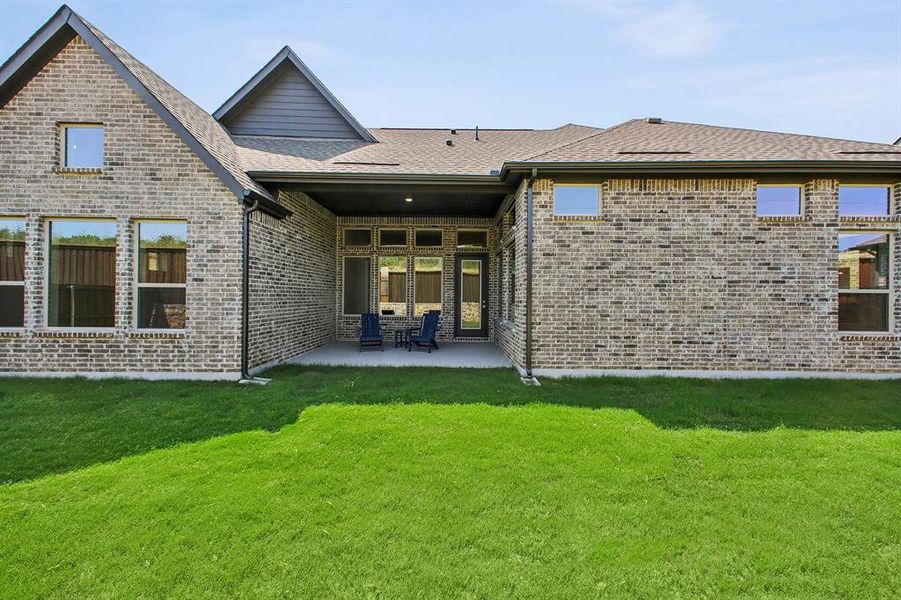 Front exterior of a new home in Elements at Viridian - Garden Series, Arlington, TX, highlighting curb appeal (Image 2). Front exterior of a new home in Elements at Viridian - Garden Series, Arlington, TX, highlighting curb appeal (Image 2).